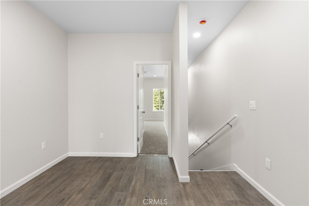 5583 Linrich Lane Paradise, CA 95969 - Photo 16 of 33 an empty room with wooden floor and entryway