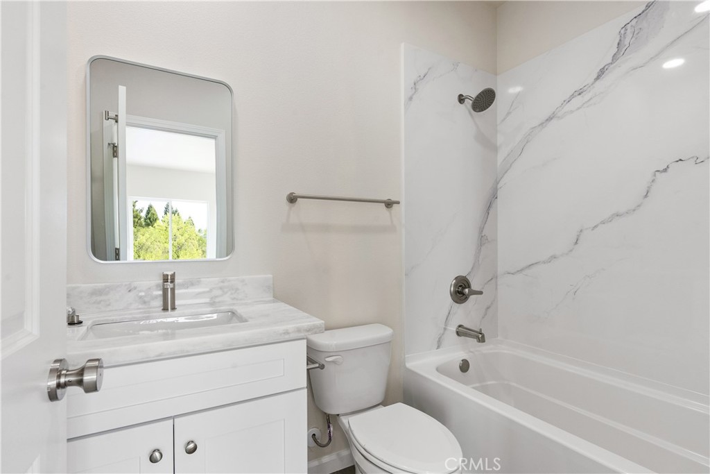 5583 Linrich Lane Paradise, CA 95969 - Photo 20 of 33 a bathroom with a sink toilet and shower