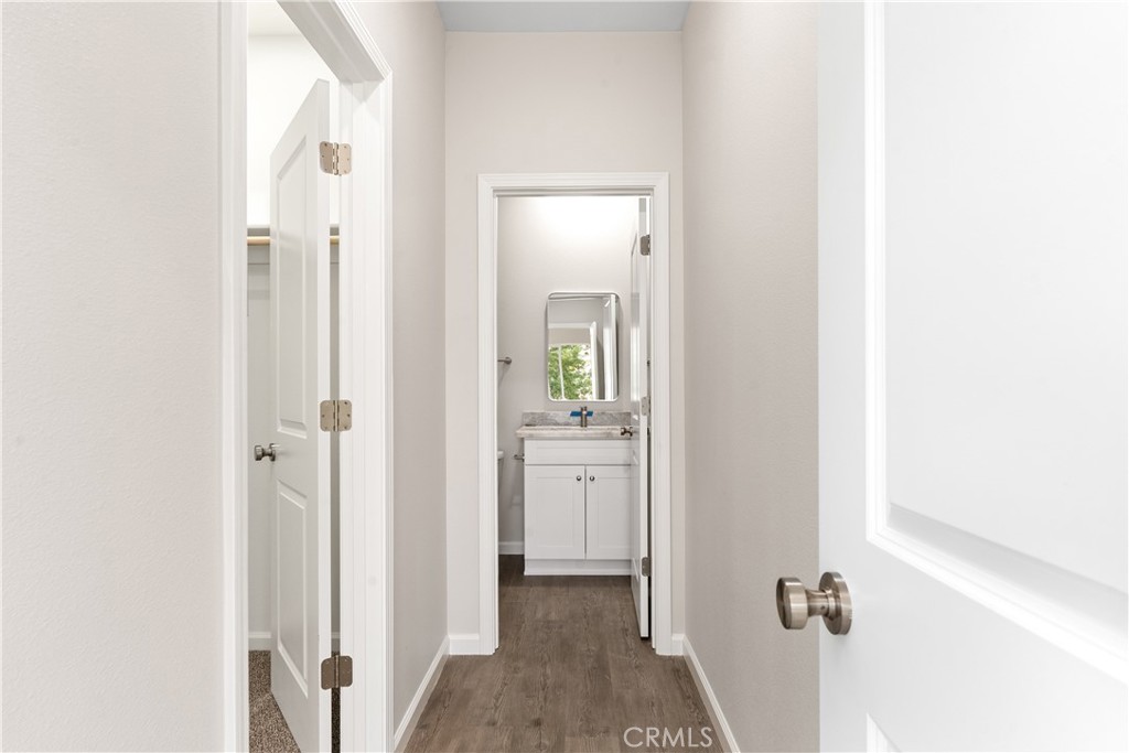 5583 Linrich Lane Paradise, CA 95969 - Photo 25 of 33 a view of a hallway with closet and wooden floor