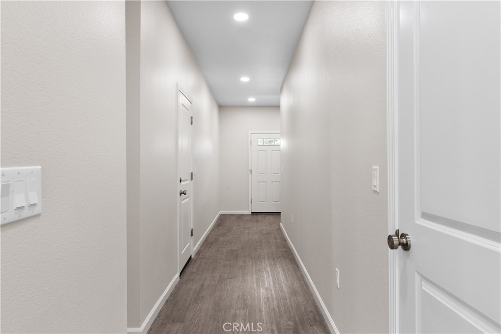 5583 Linrich Lane Paradise, CA 95969 - Photo 8 of 33 a view of a hallway with wooden floor