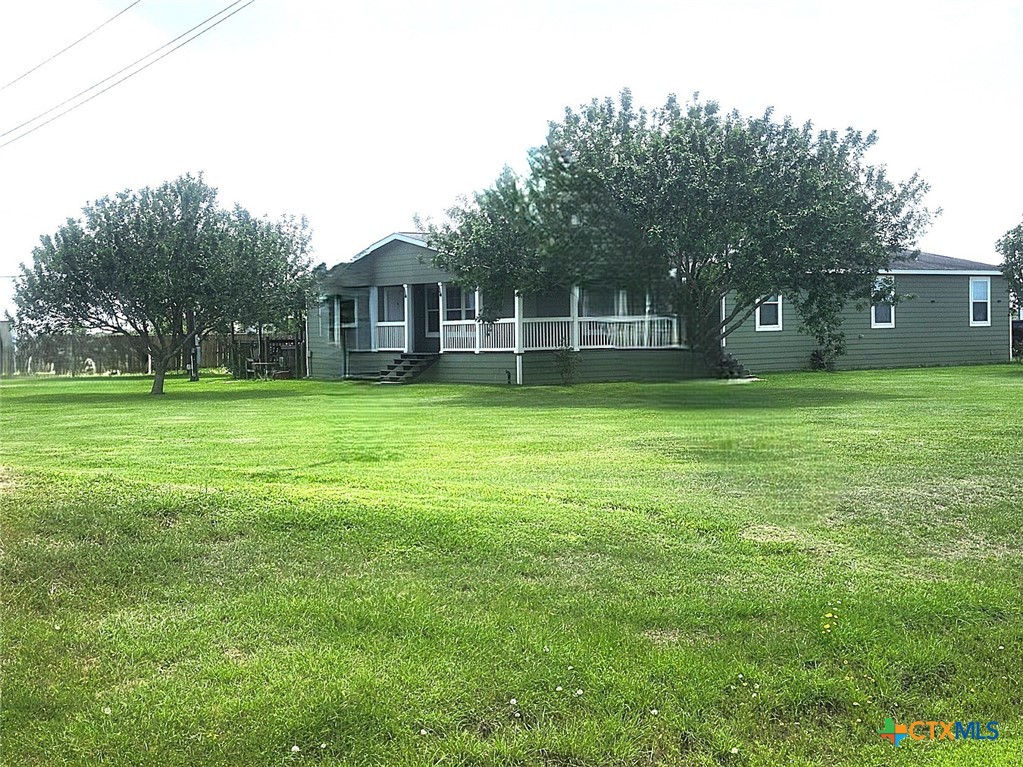 1845 Royal Road Port Lavaca, TX 77979 - Photo 21 of 22 a front view of a house with a garden