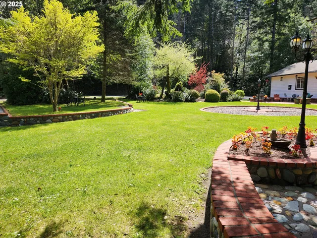 a view of a swimming pool with an outdoor space and seating area