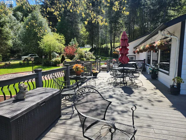 a view of a chairs and tables in the balcony