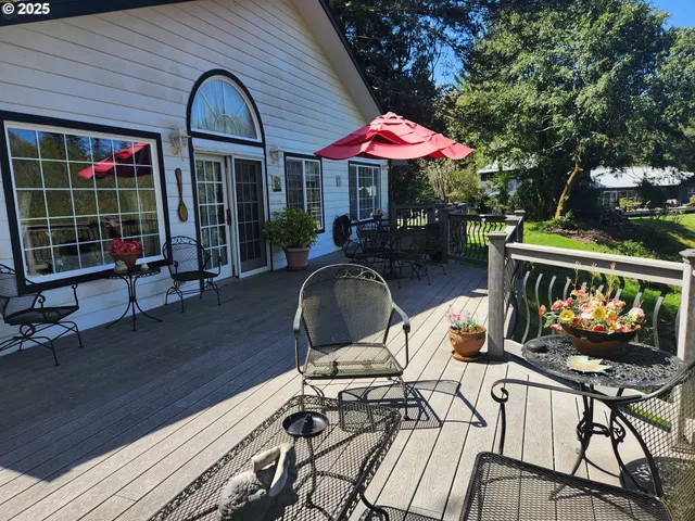a patio with tables and chairs
