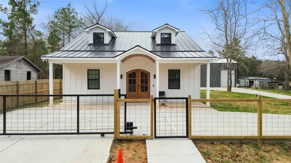 a front view of a house with a garage