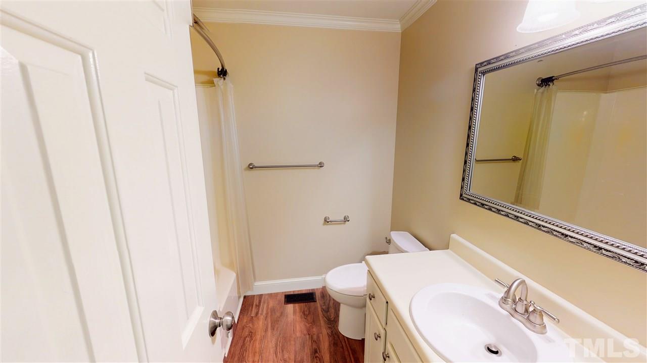 6100 Highcastle Court Raleigh, NC 27613 - Photo 18 of 23 Second full bath upstairs