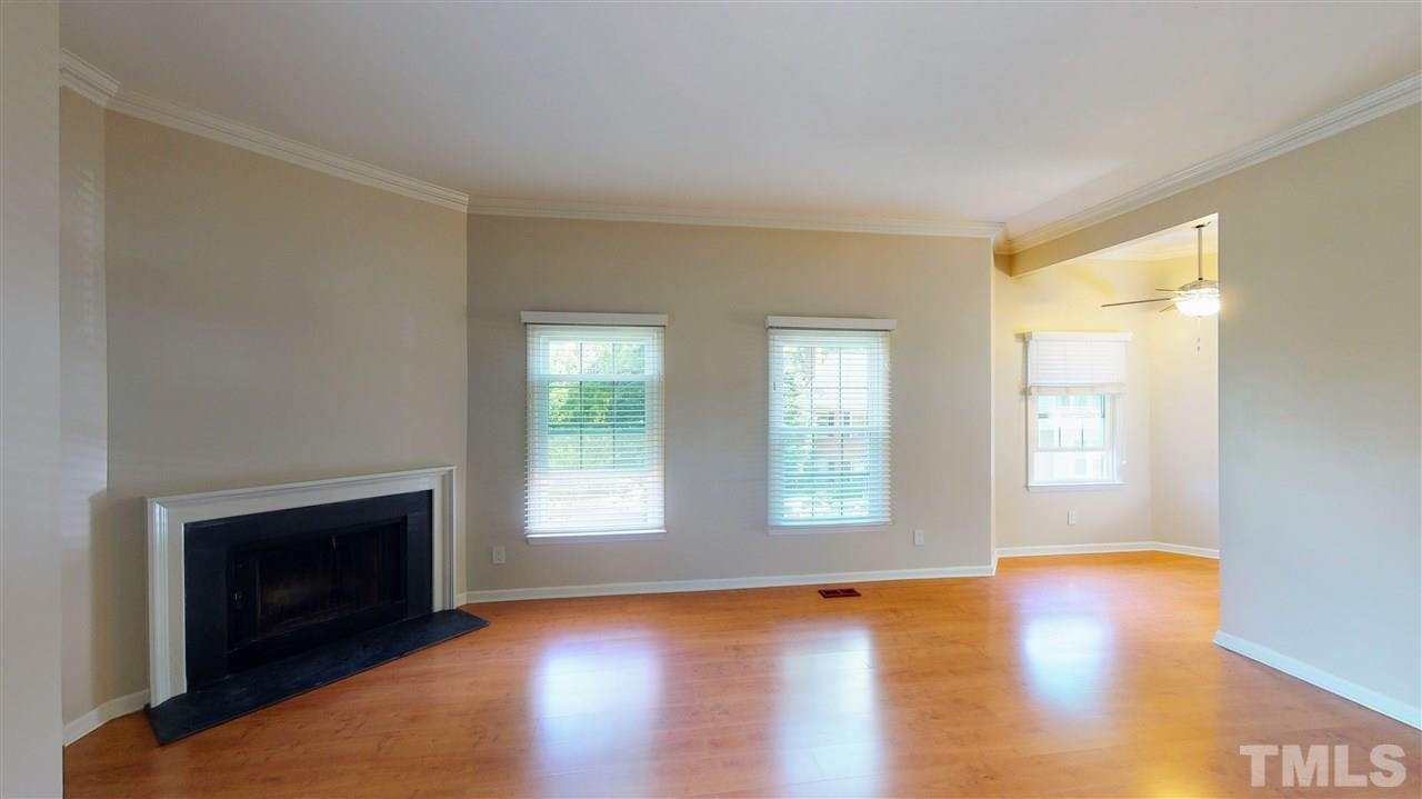 6100 Highcastle Court Raleigh, NC 27613 - Photo 4 of 23 Wood burning fireplace in Living Room