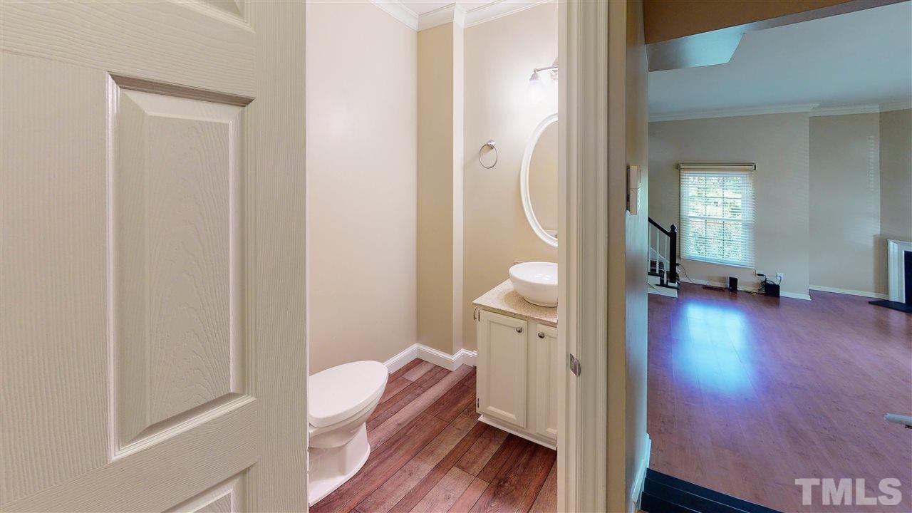 6100 Highcastle Court Raleigh, NC 27613 - Photo 10 of 23 Half bath on main level