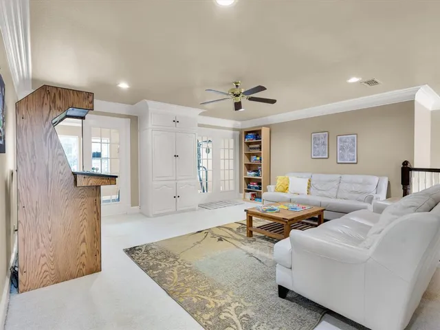 a living room with furniture and a table