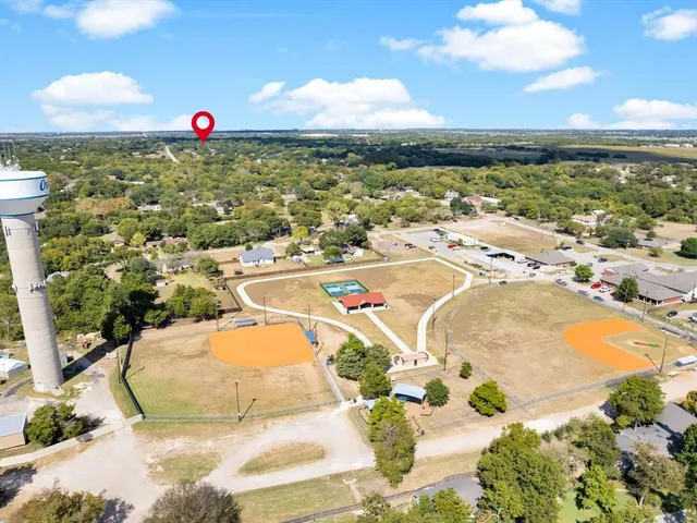 a view of a swimming pool with an ocean and beach