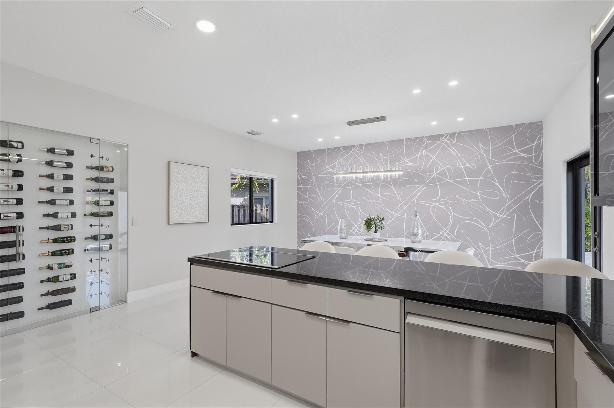 4429 Southwest 165th Court Miami, FL 33185 - Photo 19 of 58 a kitchen with a sink and a mirror