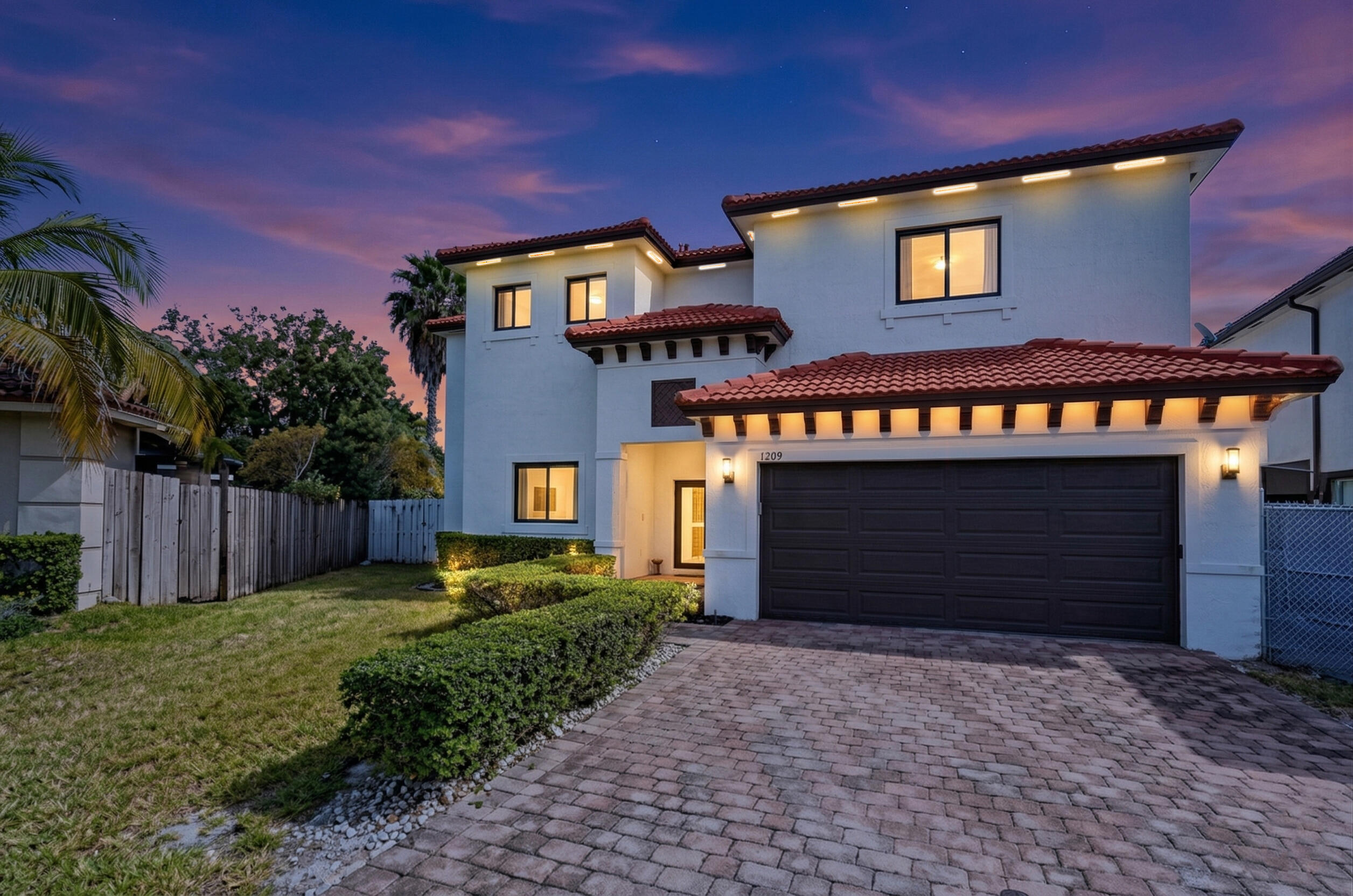 4429 Southwest 165th Court Miami, FL 33185 - Photo 2 of 58 a front view of a house with a yard