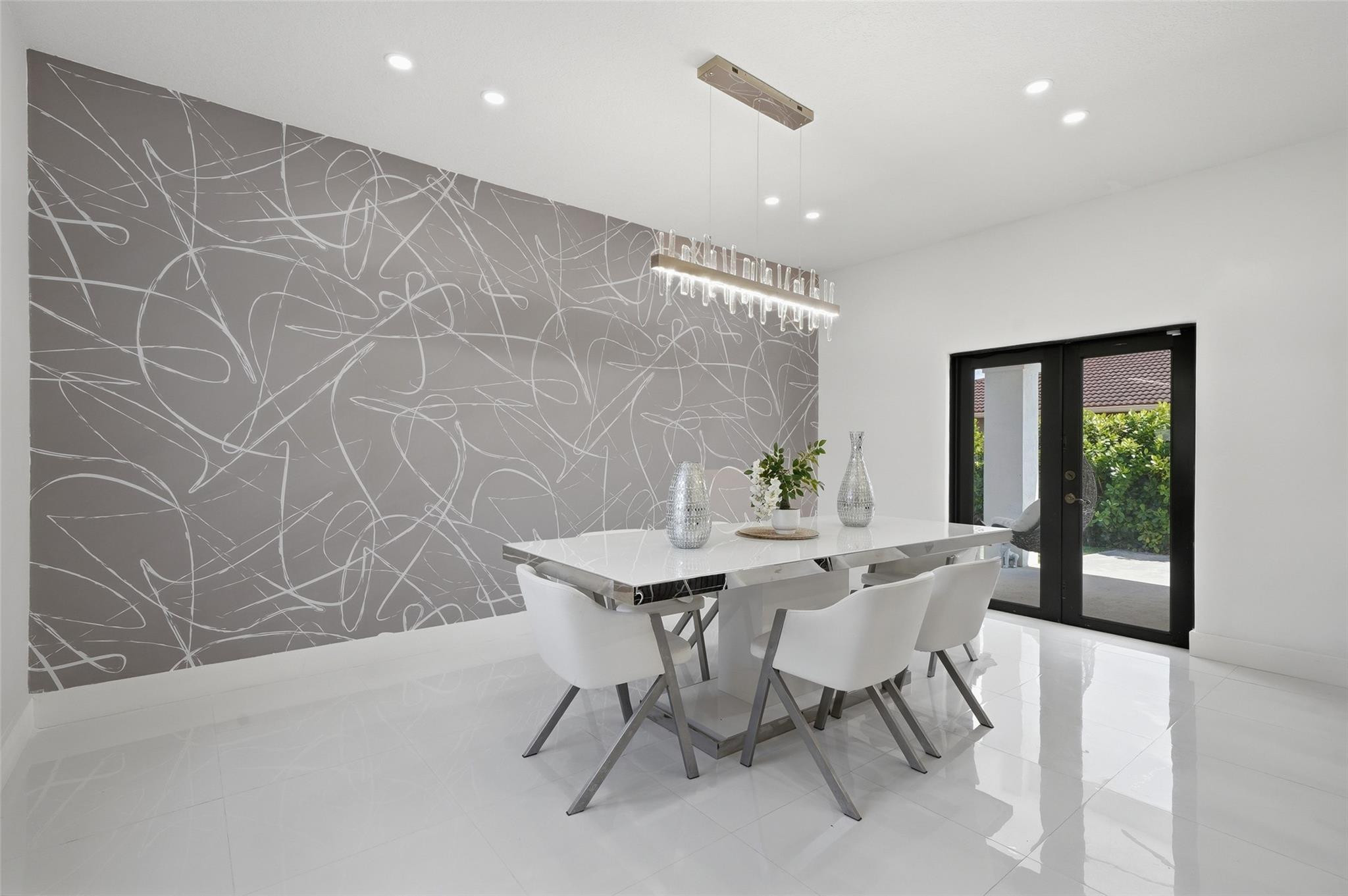4429 Southwest 165th Court Miami, FL 33185 - Photo 24 of 58 a view of a dining room with furniture and wooden floor