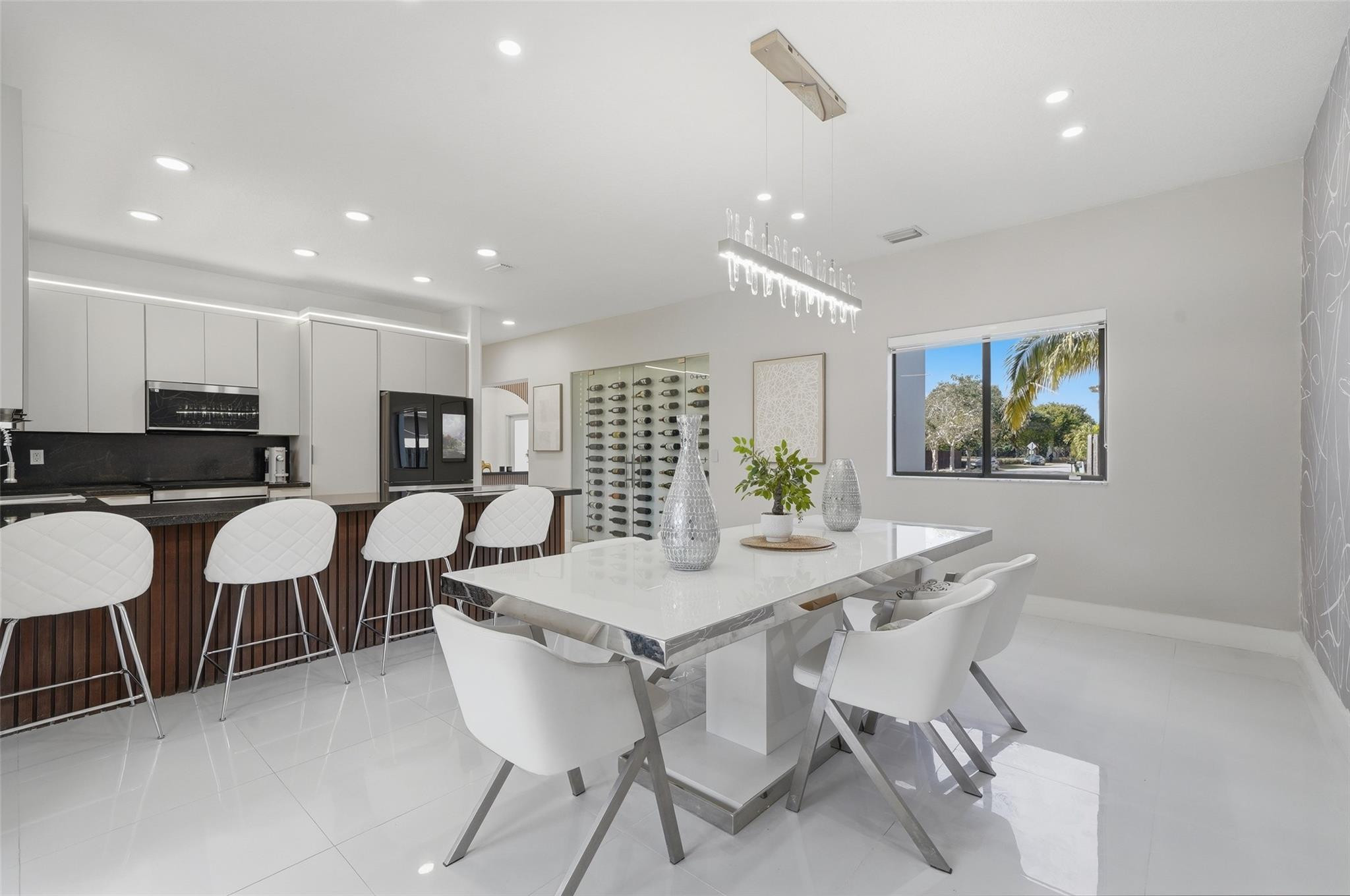 4429 Southwest 165th Court Miami, FL 33185 - Photo 26 of 58 a view of a dining room with furniture