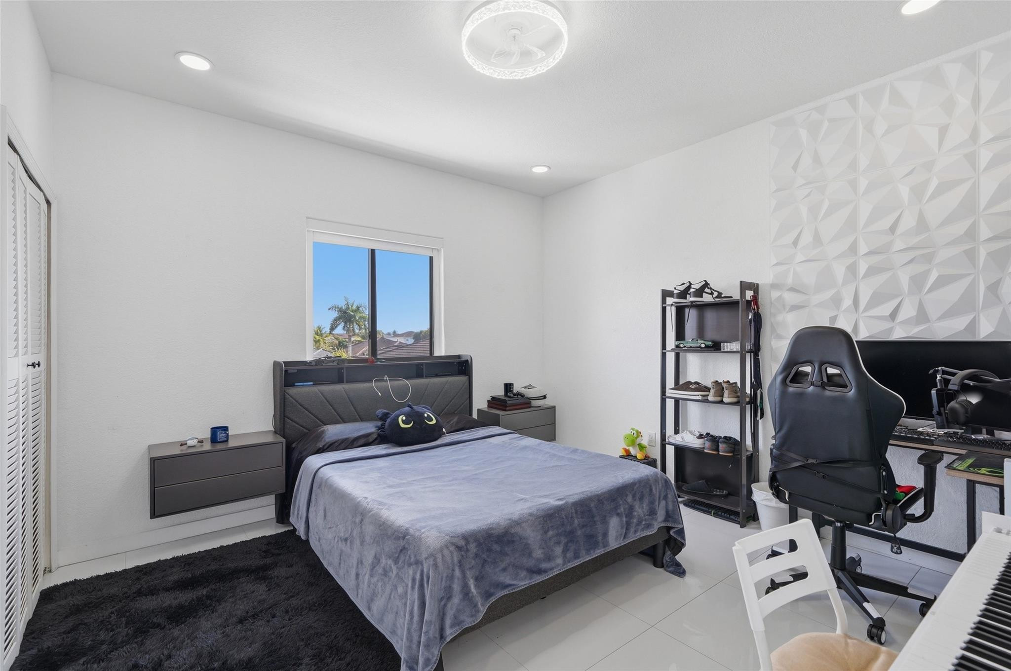 4429 Southwest 165th Court Miami, FL 33185 - Photo 29 of 58 a bedroom with a bed and furniture