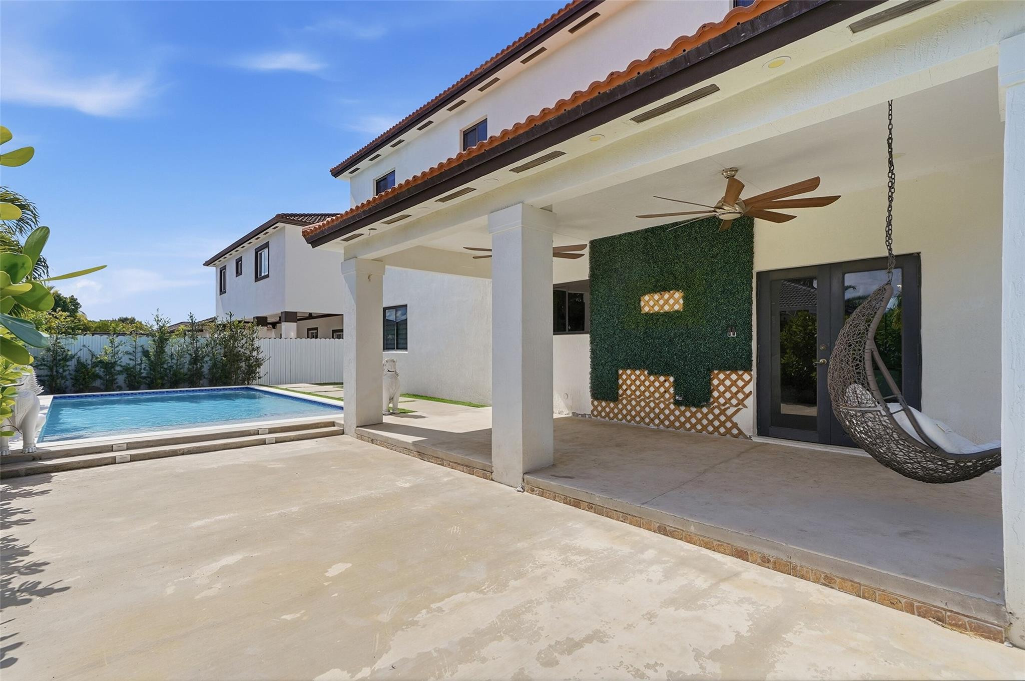 4429 Southwest 165th Court Miami, FL 33185 - Photo 49 of 58 a view of a porch with a tv
