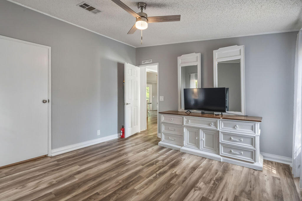 191 Beech Street Freeport, FL 32439 - Photo 12 of 18 a view of a livingroom with furniture and a flat screen tv