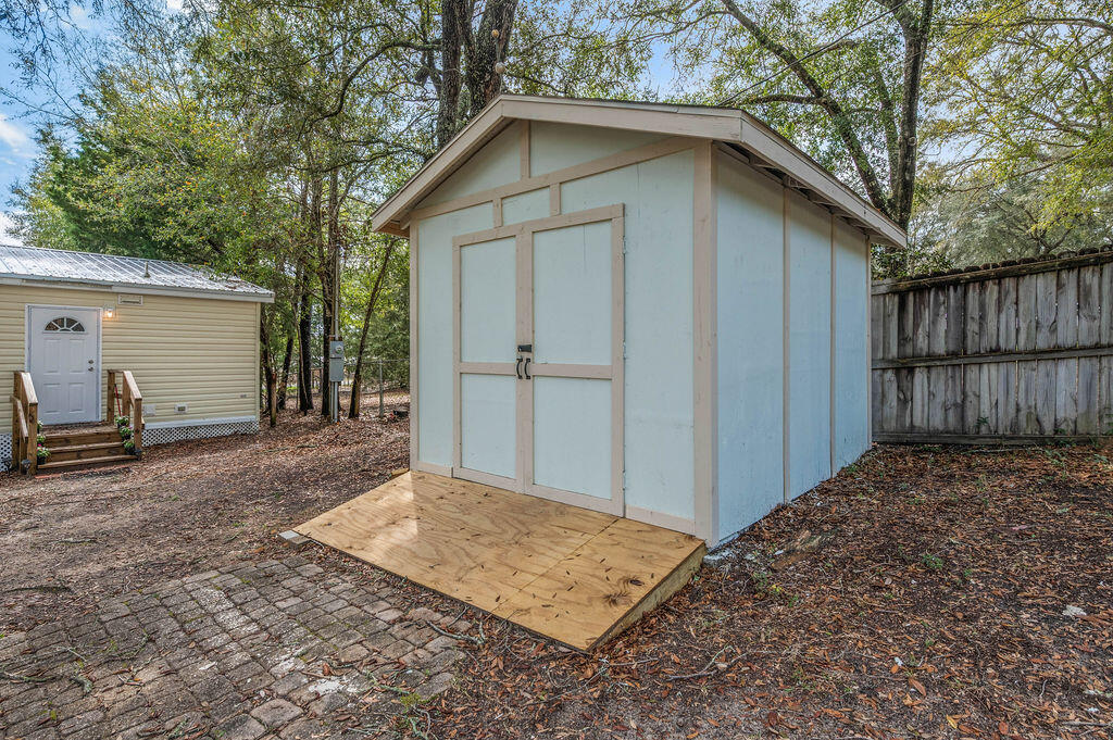 191 Beech Street Freeport, FL 32439 - Photo 17 of 18 a view of a house with a yard