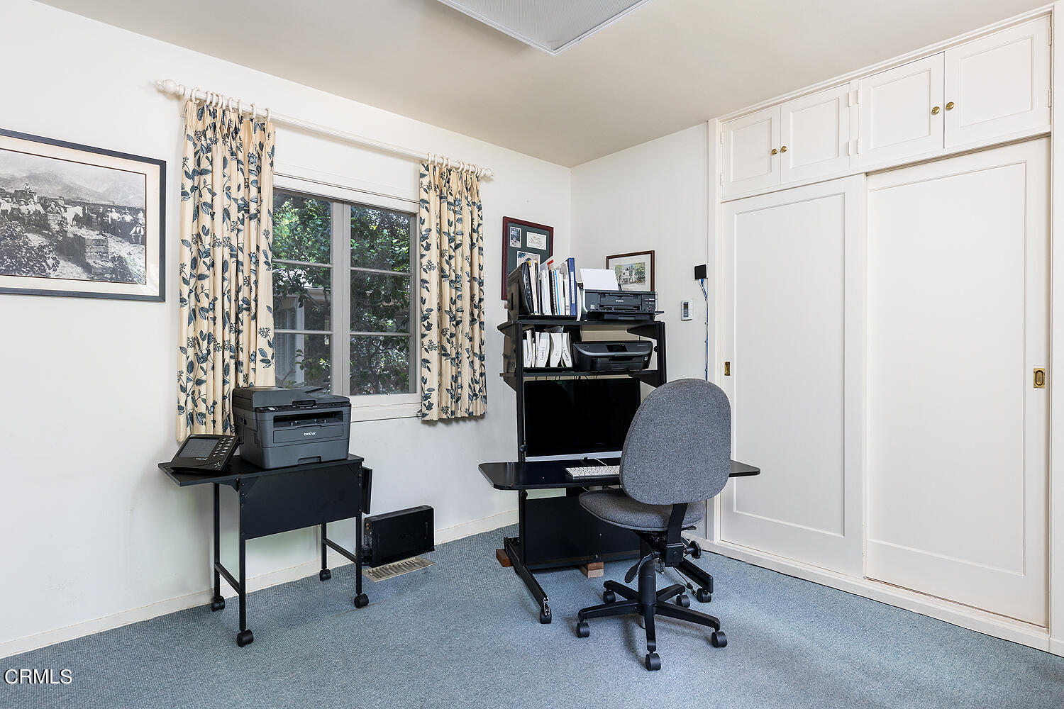 658 Chaucer Road San Marino, CA 91108 - Photo 21 of 39 a view of a workspace with furniture and a window