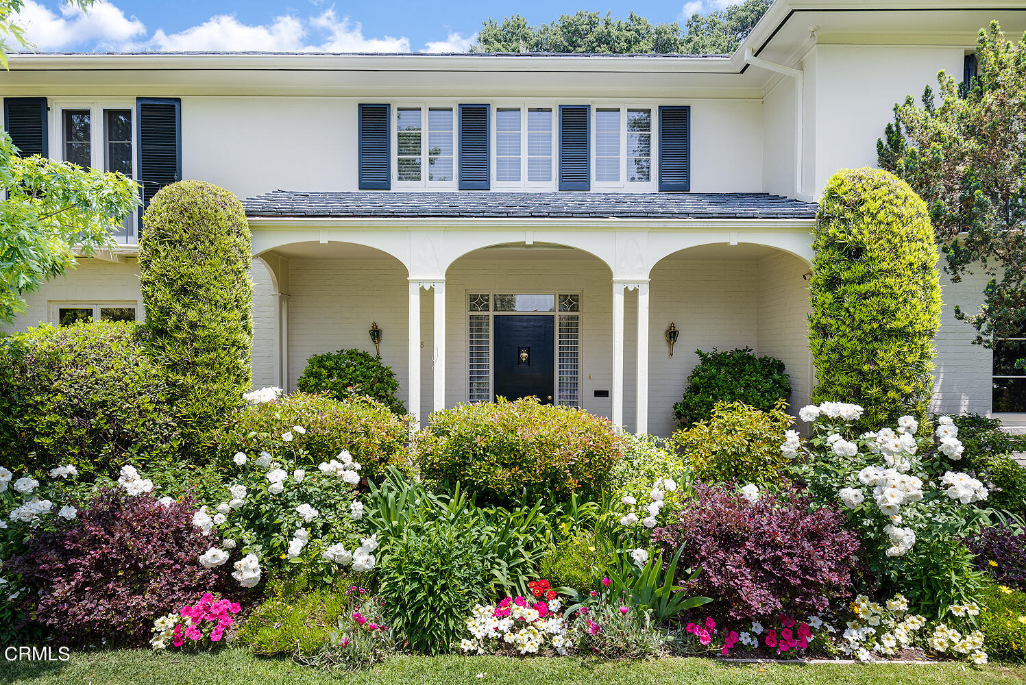 658 Chaucer Road San Marino, CA 91108 - Photo 3 of 39 a view of a house with potted plants