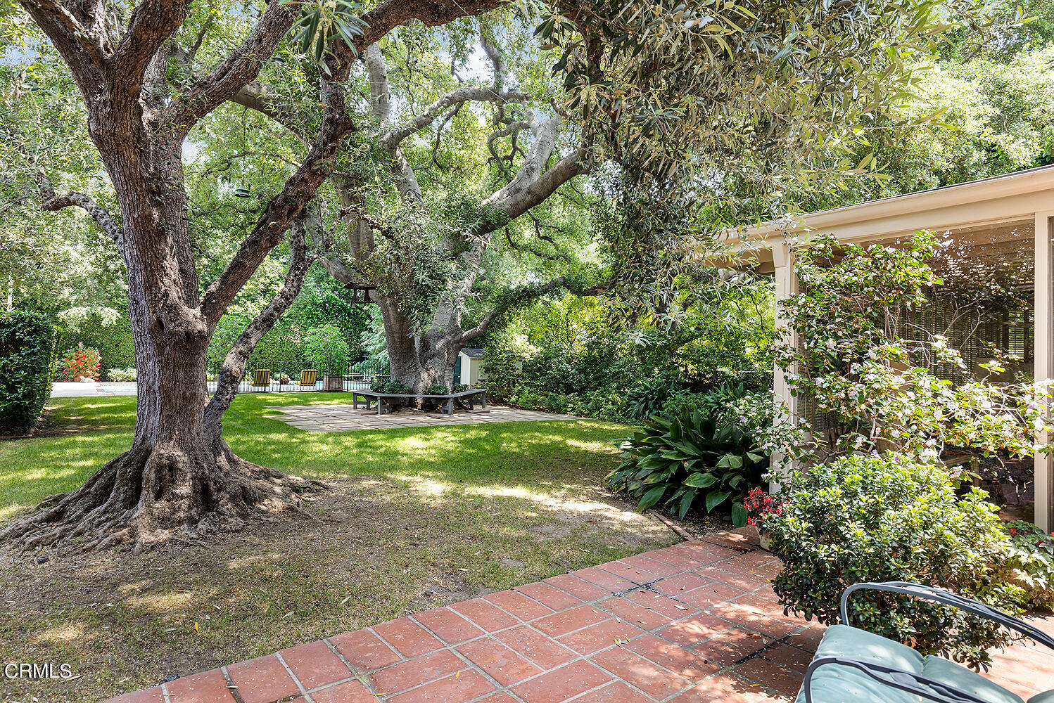 658 Chaucer Road San Marino, CA 91108 - Photo 34 of 39 a view of a yard with large trees