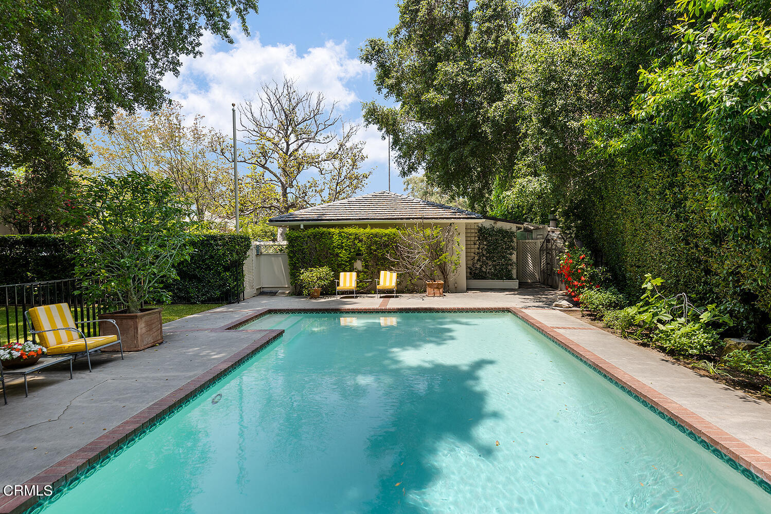 658 Chaucer Road San Marino, CA 91108 - Photo 37 of 39 a view of a swimming pool with a patio and a yard