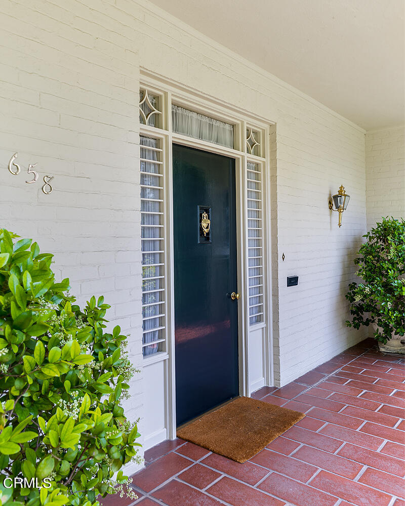 658 Chaucer Road San Marino, CA 91108 - Photo 4 of 39 a view of a front door and potted plants