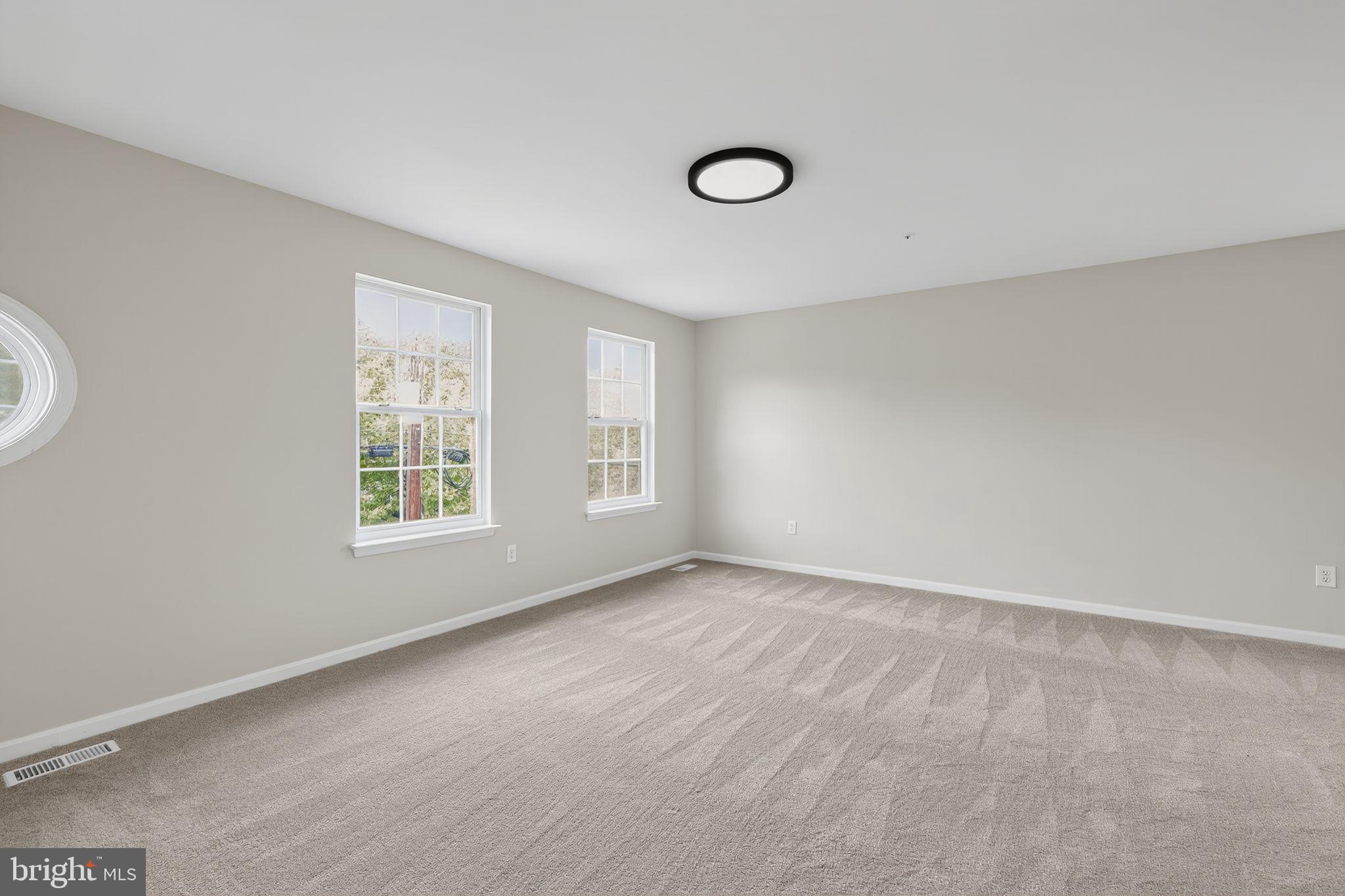 3003 Hillside Avenue Landover, MD 20785 - Photo 21 of 38 an empty room with windows