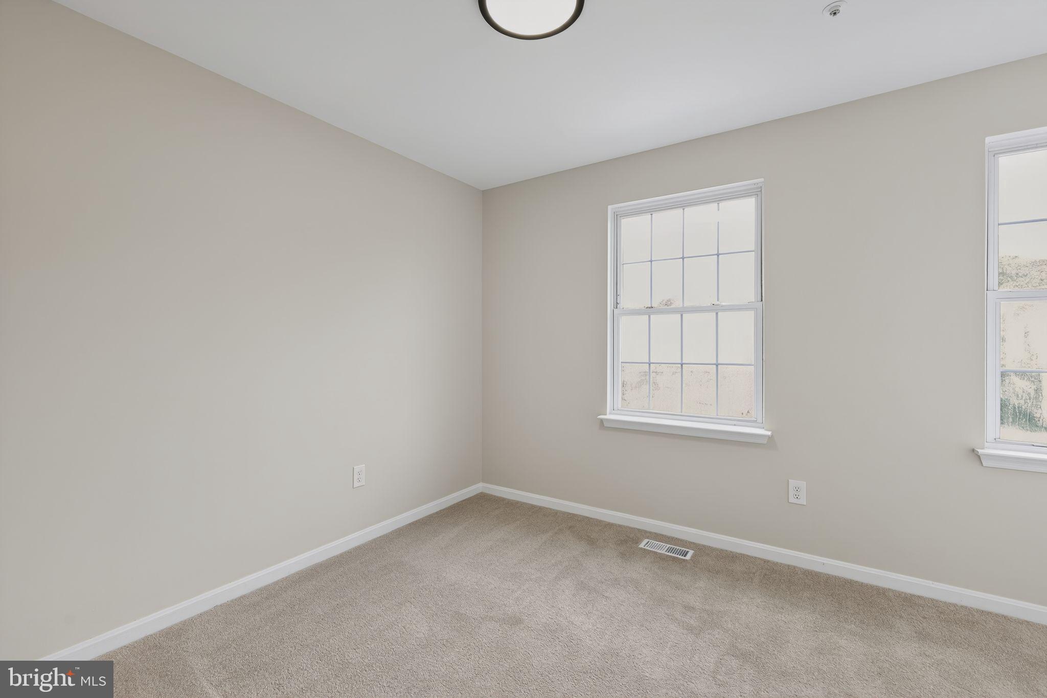 3003 Hillside Avenue Landover, MD 20785 - Photo 27 of 38 an empty room with a window