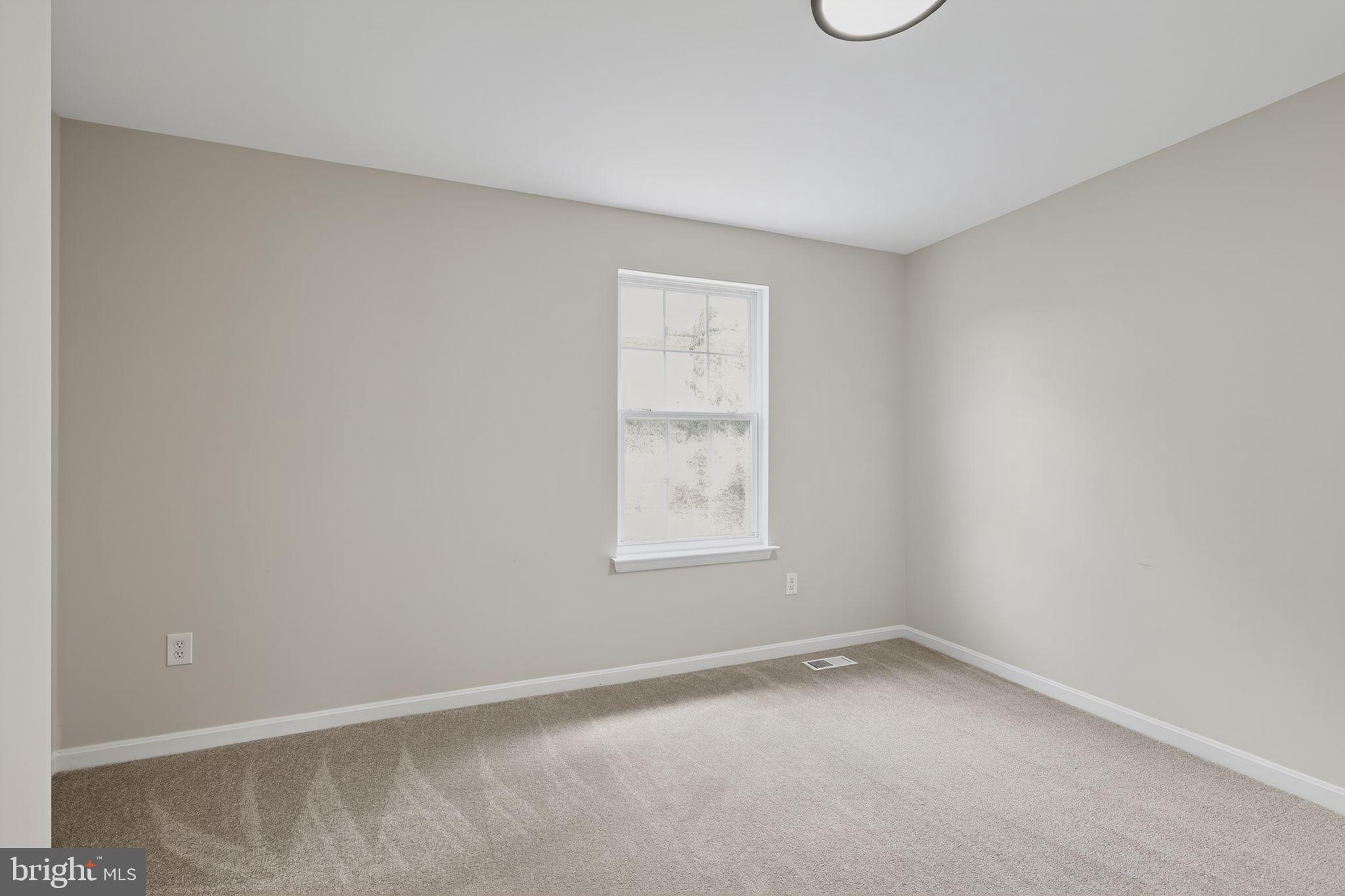 3003 Hillside Avenue Landover, MD 20785 - Photo 29 of 38 an empty room with a window