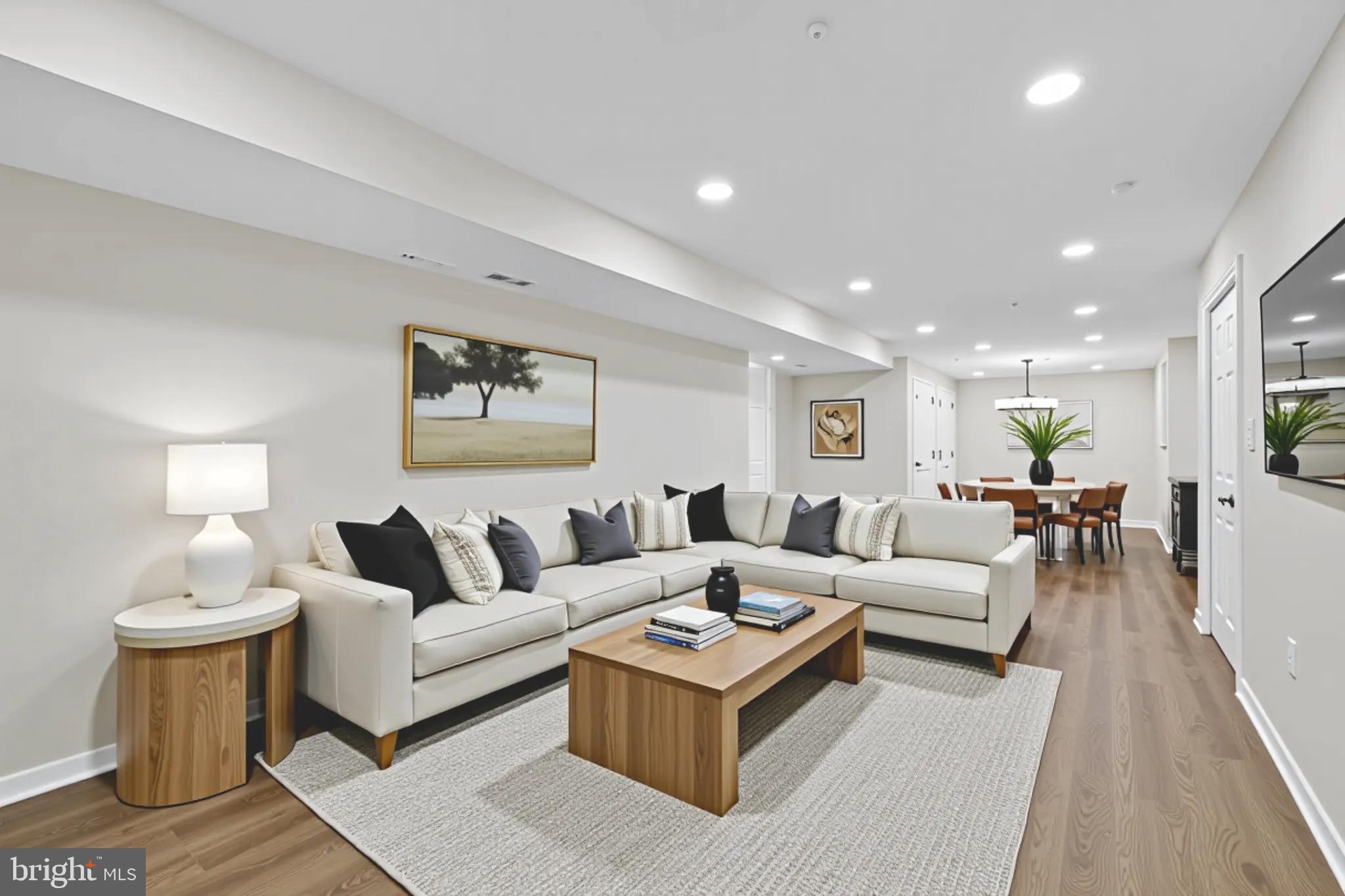 3003 Hillside Avenue Landover, MD 20785 - Photo 31 of 38 a living room with furniture and a wooden floor