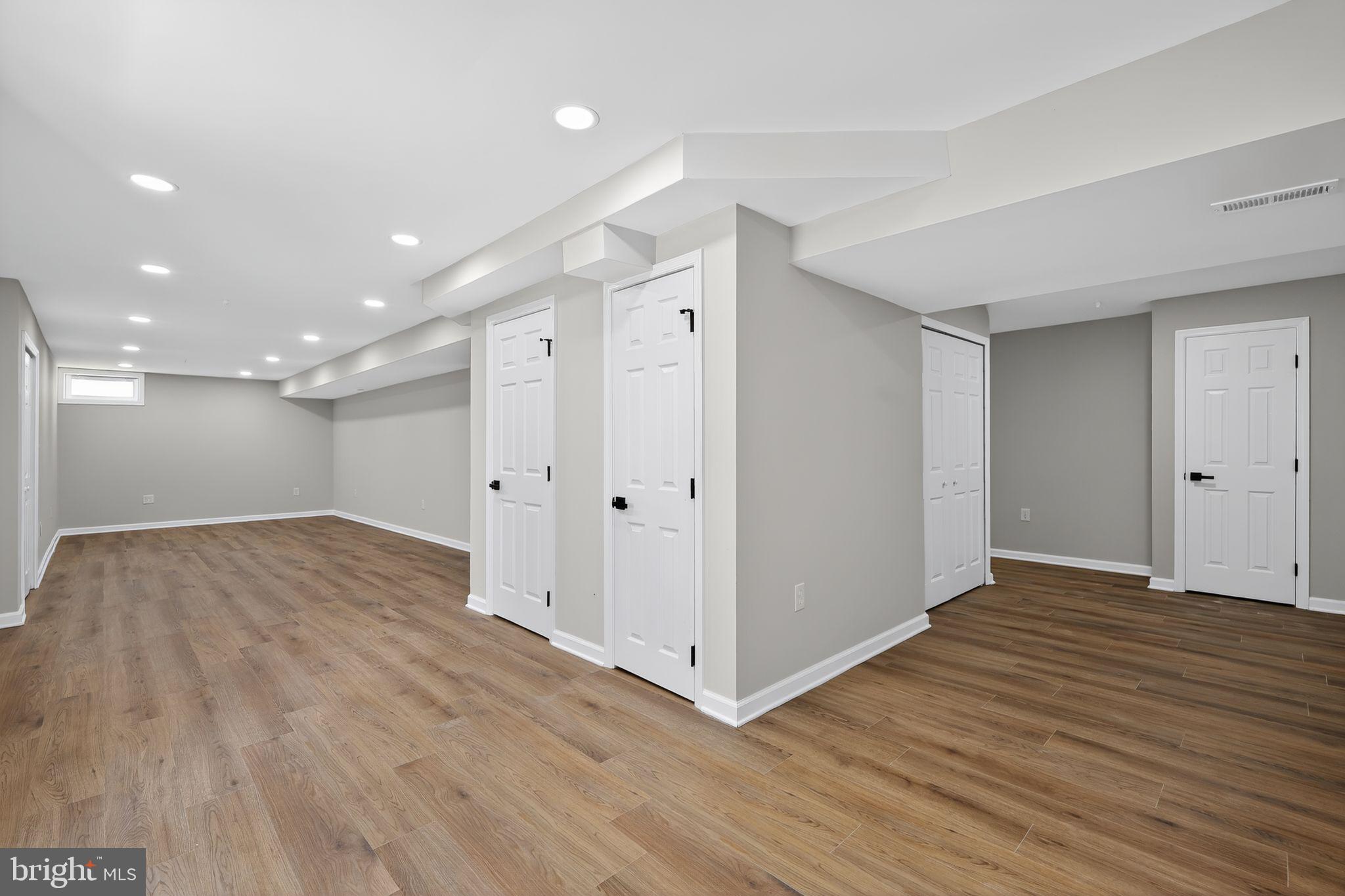 3003 Hillside Avenue Landover, MD 20785 - Photo 33 of 38 a view of an empty room with wooden floor