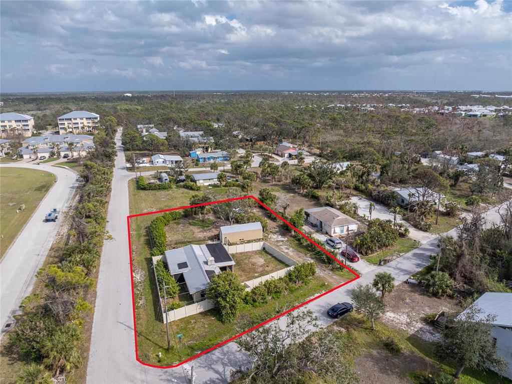 2191 Williamsburg Way Englewood, FL 34224 - Photo 1 of 1 an aerial view of multiple house