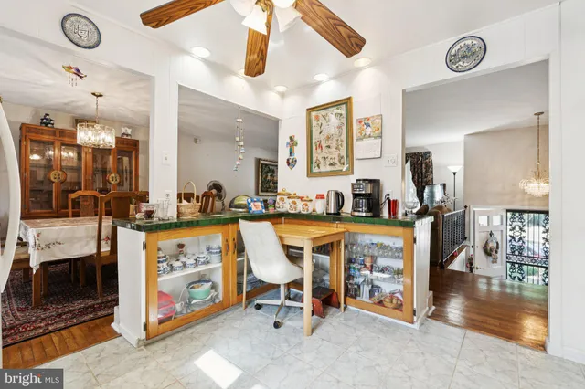 a view of living room filled with furniture and window