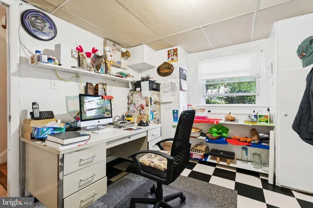 a room with furniture toys and a window