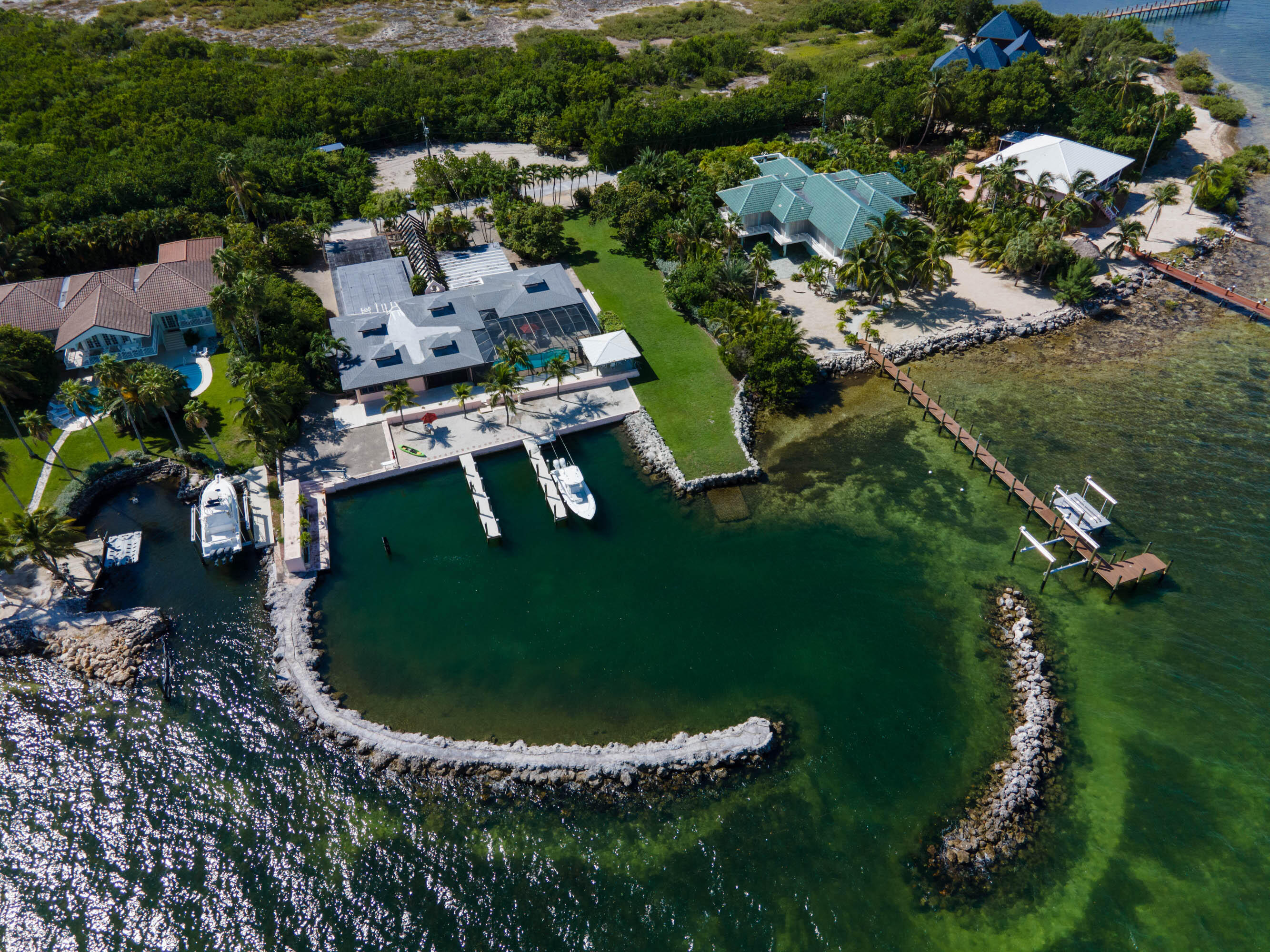 57121 Morton Street Marathon, FL 33050 - Photo 64 of 66 an aerial view of a house with a swimming pool yard and outdoor seating
