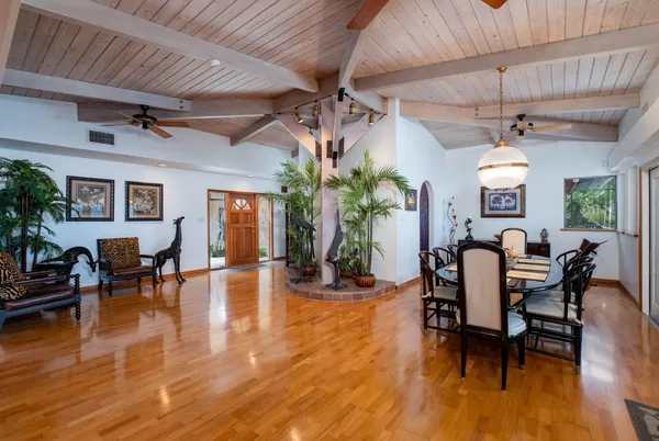 a view of a living room and dining room