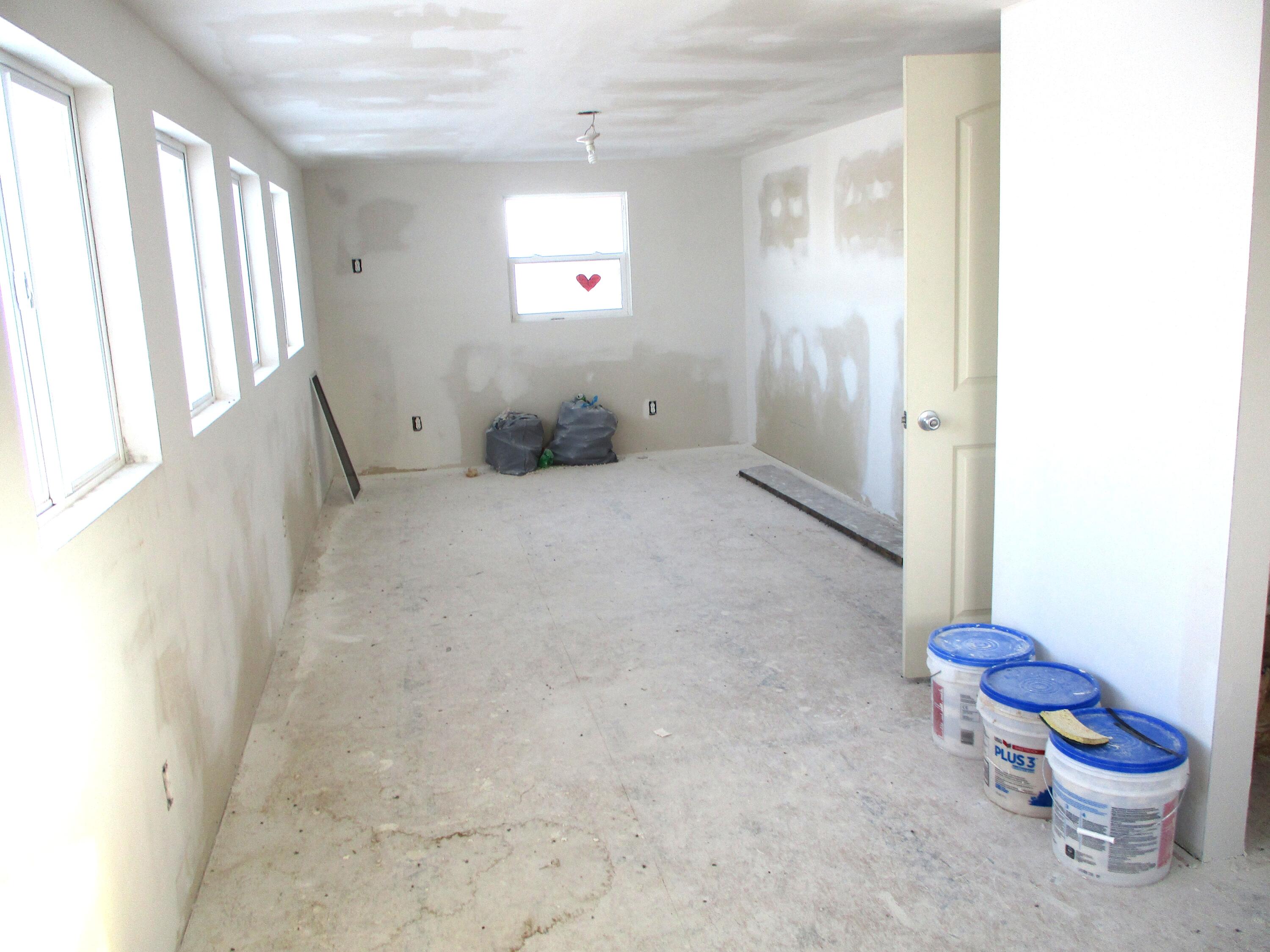 1158 South State Road Hebron, IN 46341 - Photo 11 of 19 a view of a room with a windows and wooden door
