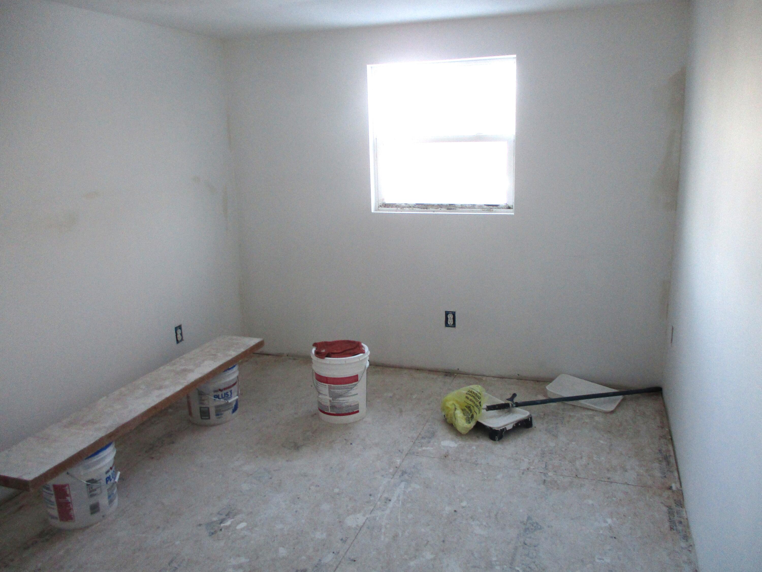 1158 South State Road Hebron, IN 46341 - Photo 12 of 19 a room with a chair and a window