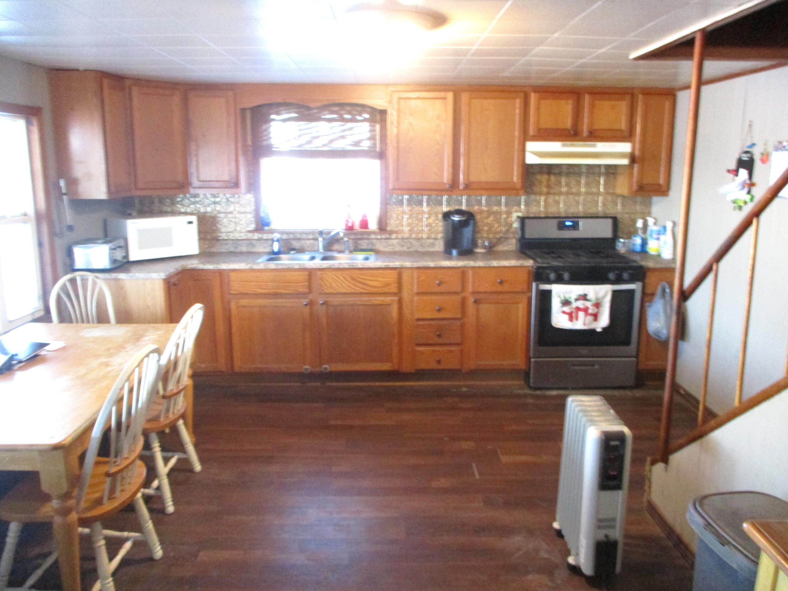 1158 South State Road Hebron, IN 46341 - Photo 2 of 19 a dining room with furniture and window