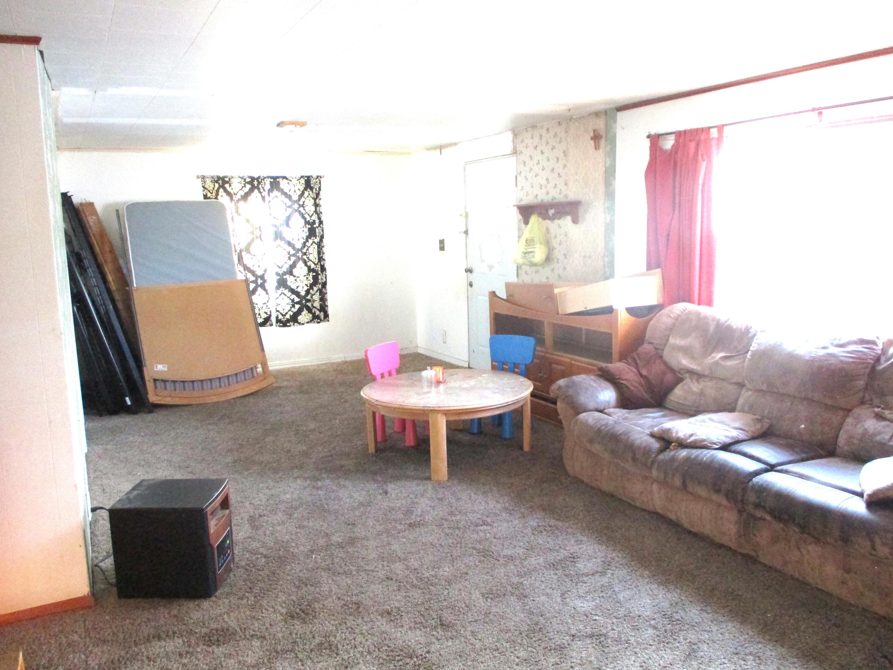 1158 South State Road Hebron, IN 46341 - Photo 4 of 19 a living room with furniture and a couch