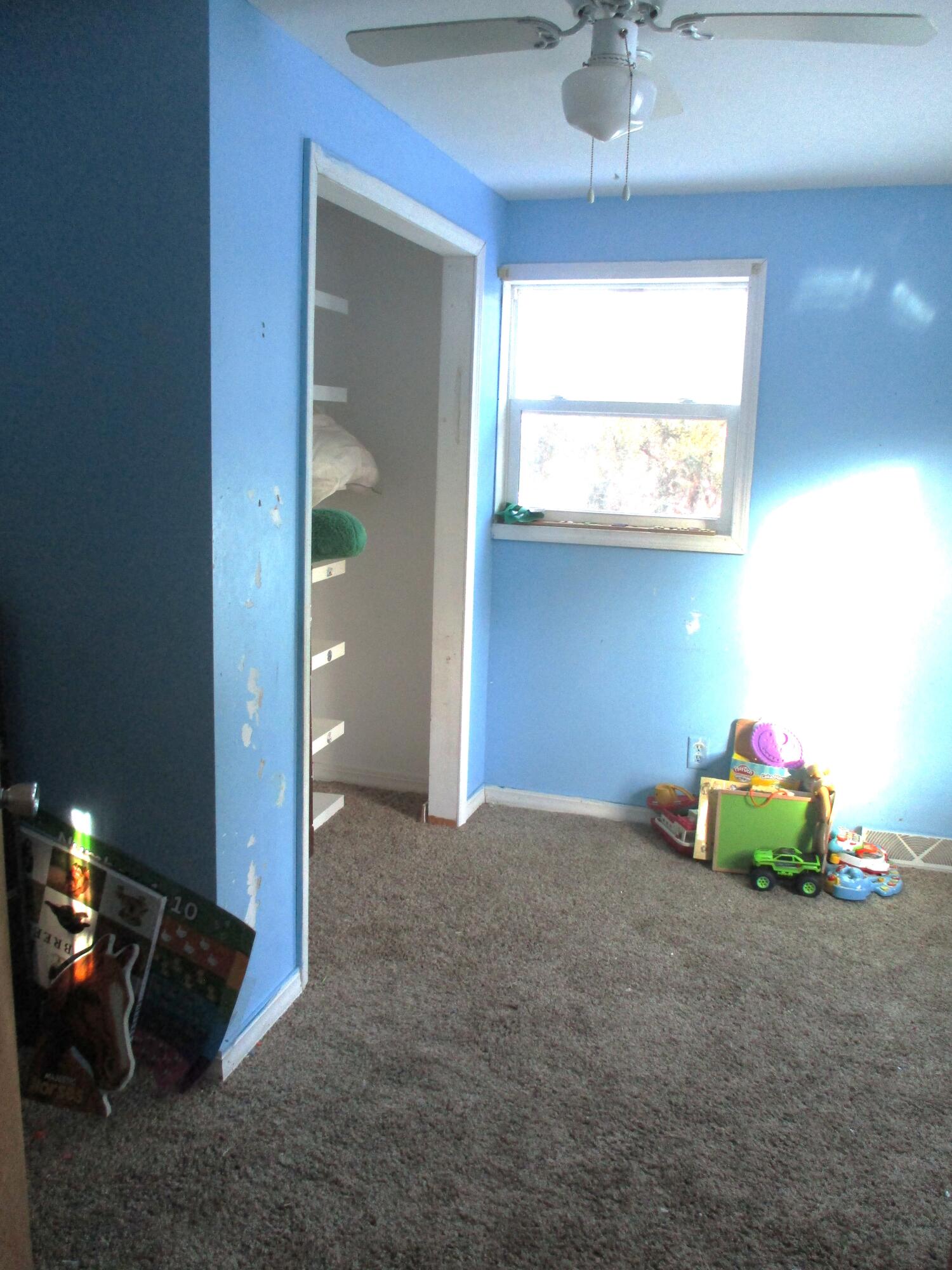 1158 South State Road Hebron, IN 46341 - Photo 8 of 19 a view of an empty room with a window