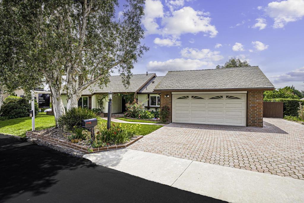 753 Rocking Horse Road Vista, CA 92081 - Photo 1 of 1 Gorgeous curb appeal with a well manicured lawn, beautiful flowers, mature trees and lots of parking