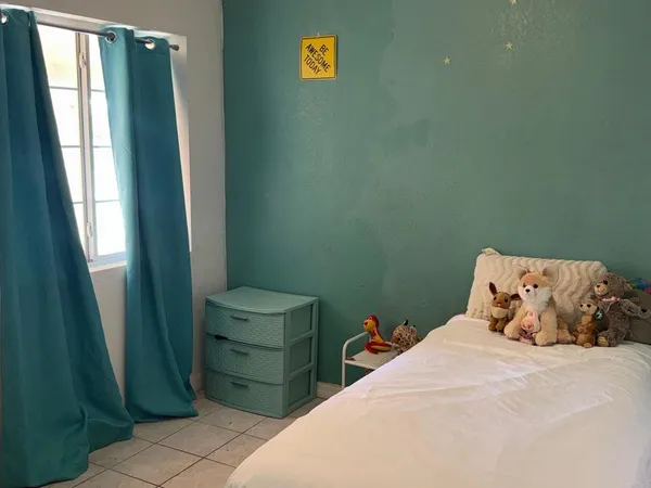 a bathroom with a shower and a toilet