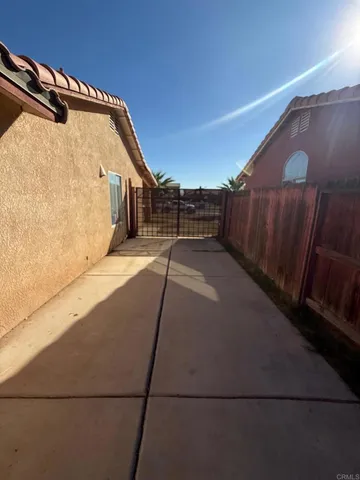 a kitchen with stainless steel appliances granite countertop a refrigerator sink and cabinets