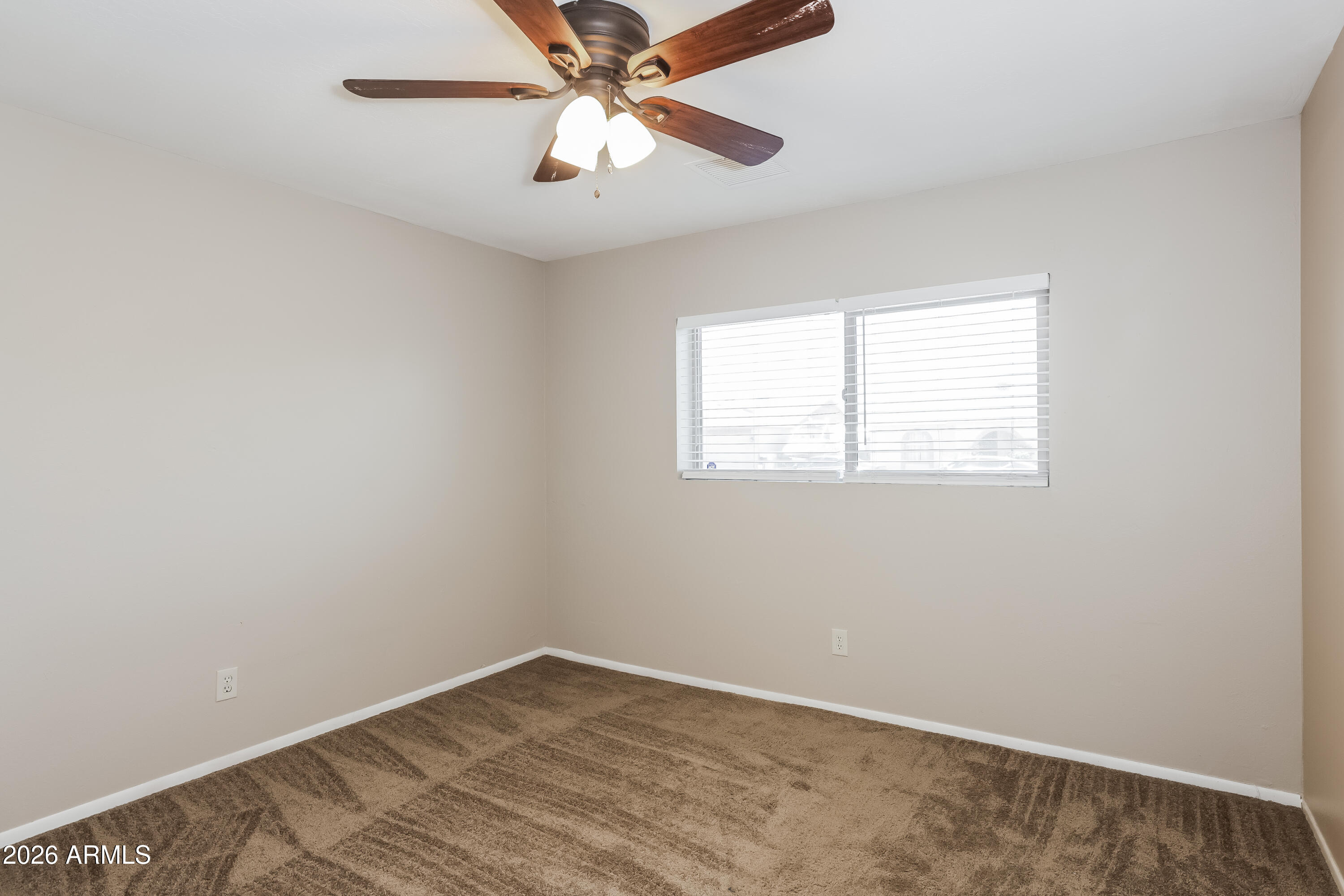 5620 West Hearn Road Glendale, AZ 85306 - Photo 7 of 15 1006311.5620 W HEARN RD - Bedroom_1