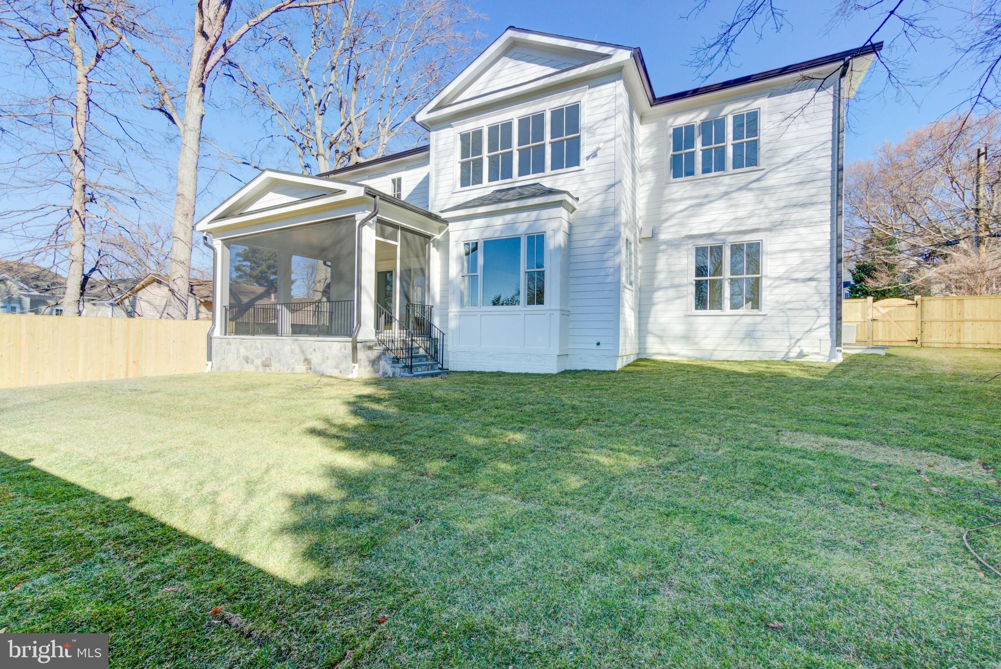 7408 Pyle Road Bethesda, MD 20817 - Photo 76 of 81 a view of a building with a yard