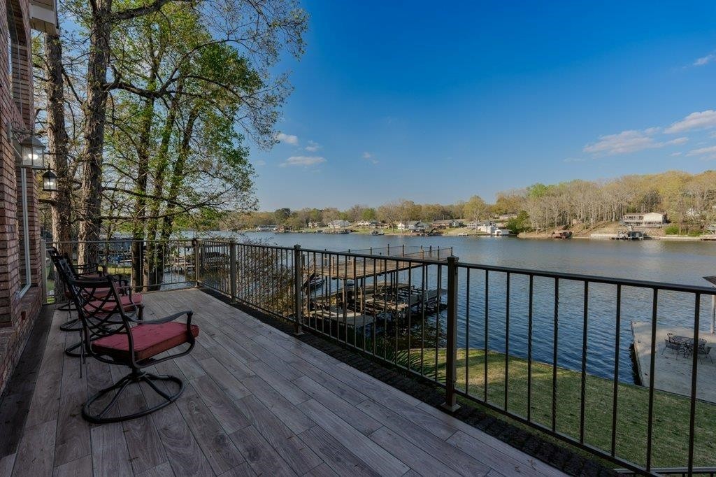 331 Carson Road Muscle Shoals, AL 35661 - Photo 14 of 38 a balcony with wooden floor and city view