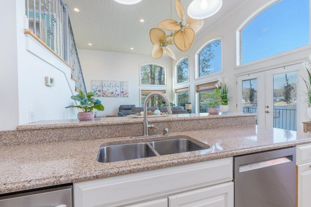331 Carson Road Muscle Shoals, AL 35661 - Photo 23 of 38 a kitchen with a sink and a potted plant