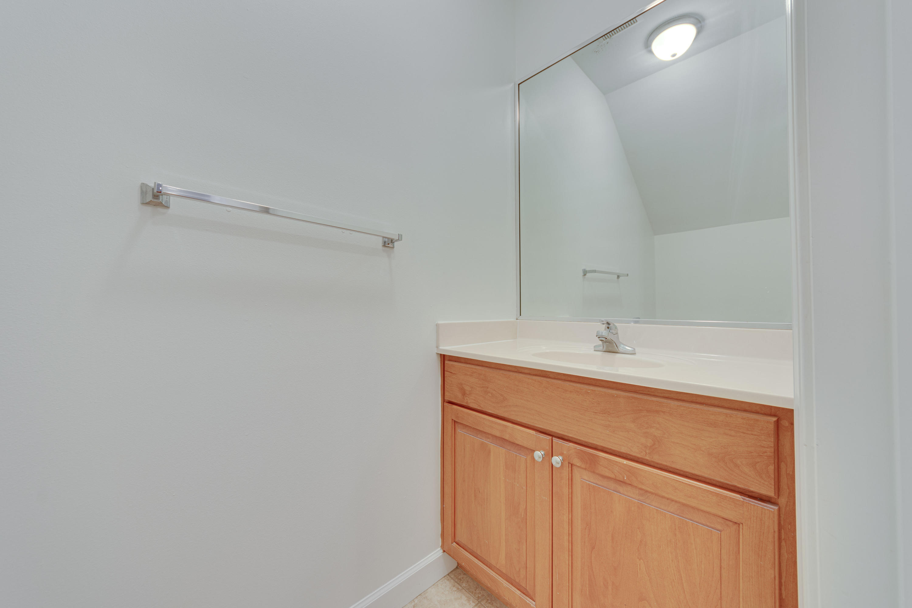 164 South Zander Way Santa Rosa Beach, FL 32459 - Photo 17 of 51 a bathroom with a sink and a mirror